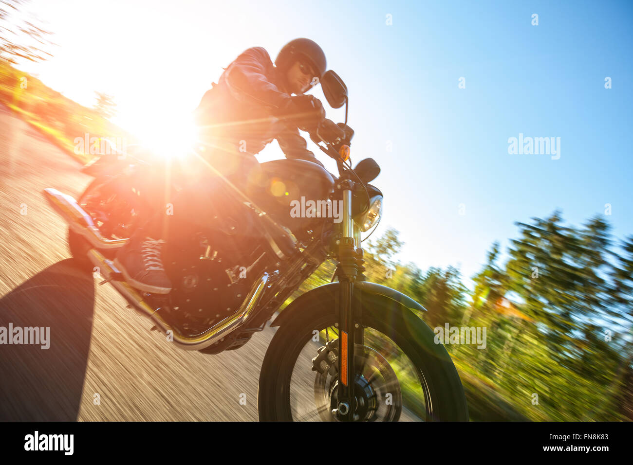 Motorcyclist riding  chopper on a road Stock Photo