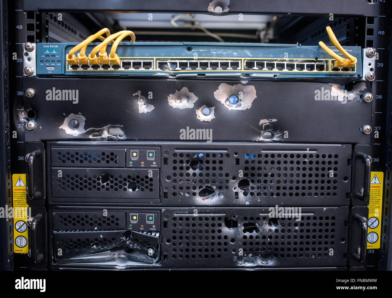 Hanover, Germany. 14th Mar, 2016. Decorative bullet holes in a server ...