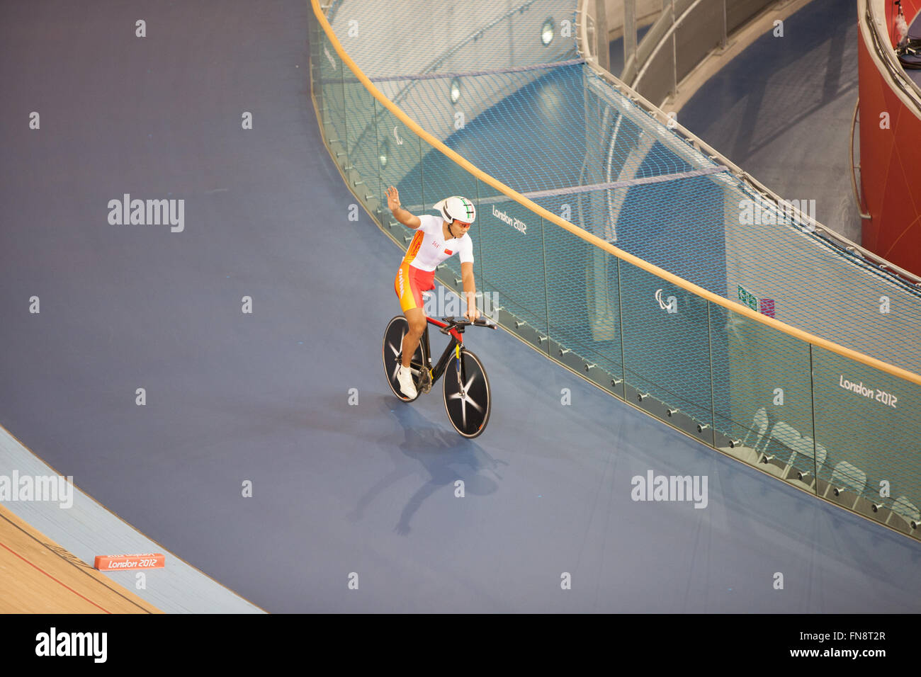 Chinese athlete,Guihua Liang wins gold medal in C2 individual pursuit in velodrome during Paralympics,London,2012,England,UK. Stock Photo