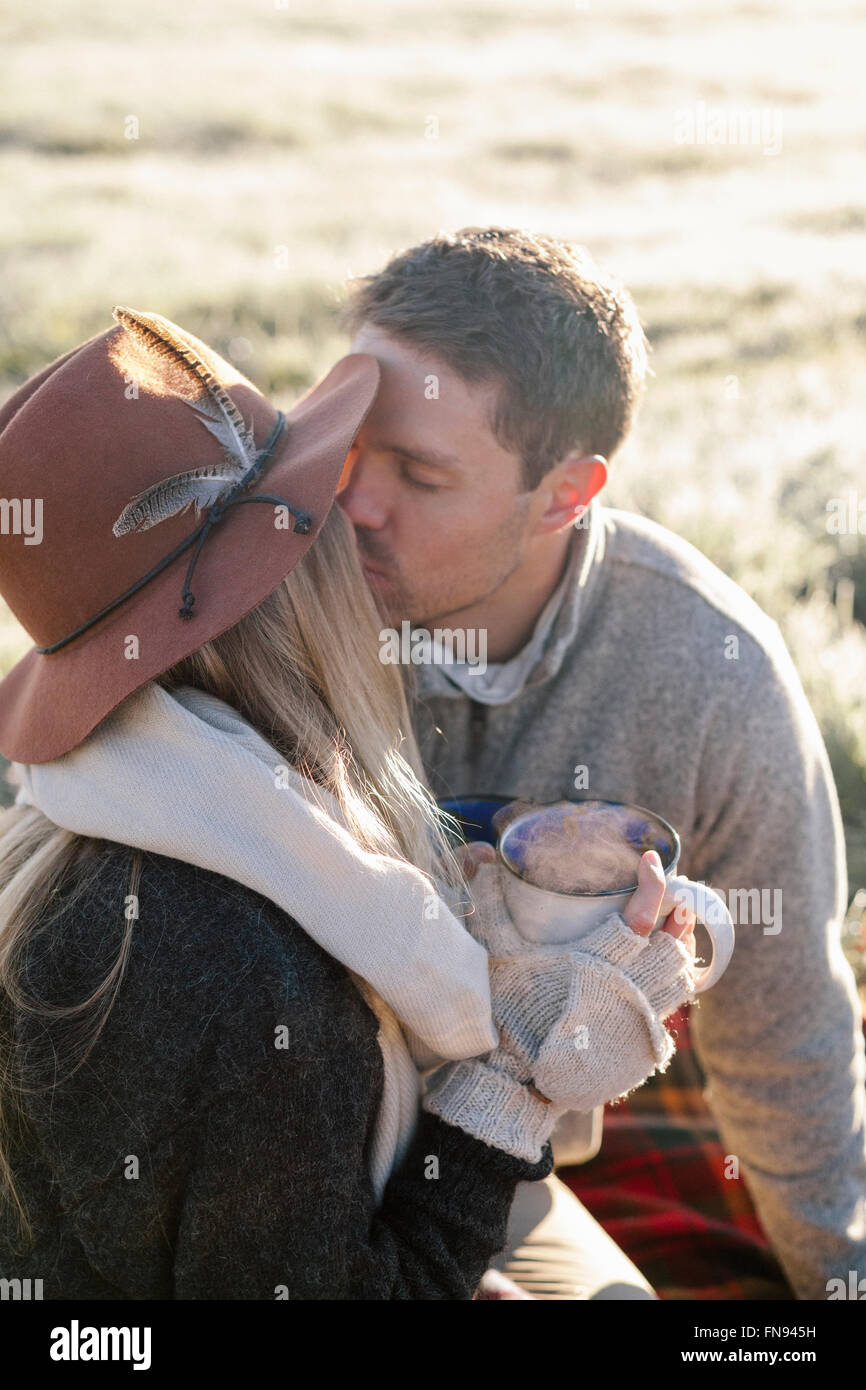 Man and woman kissing hi-res stock photography and images - Alamy