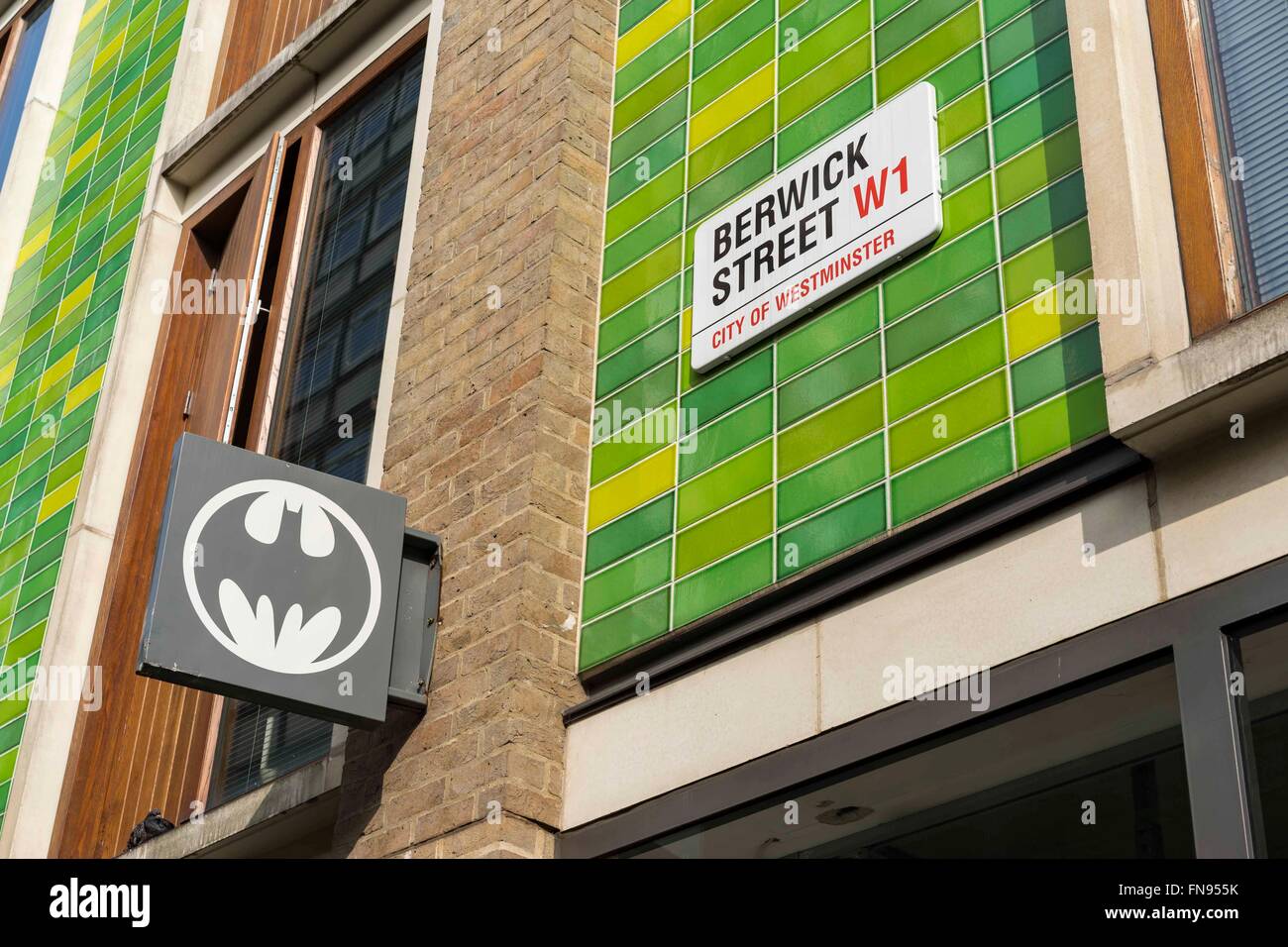 Berwick Street street sign, London W1, set on green tiled background adjacent to Stock Photo