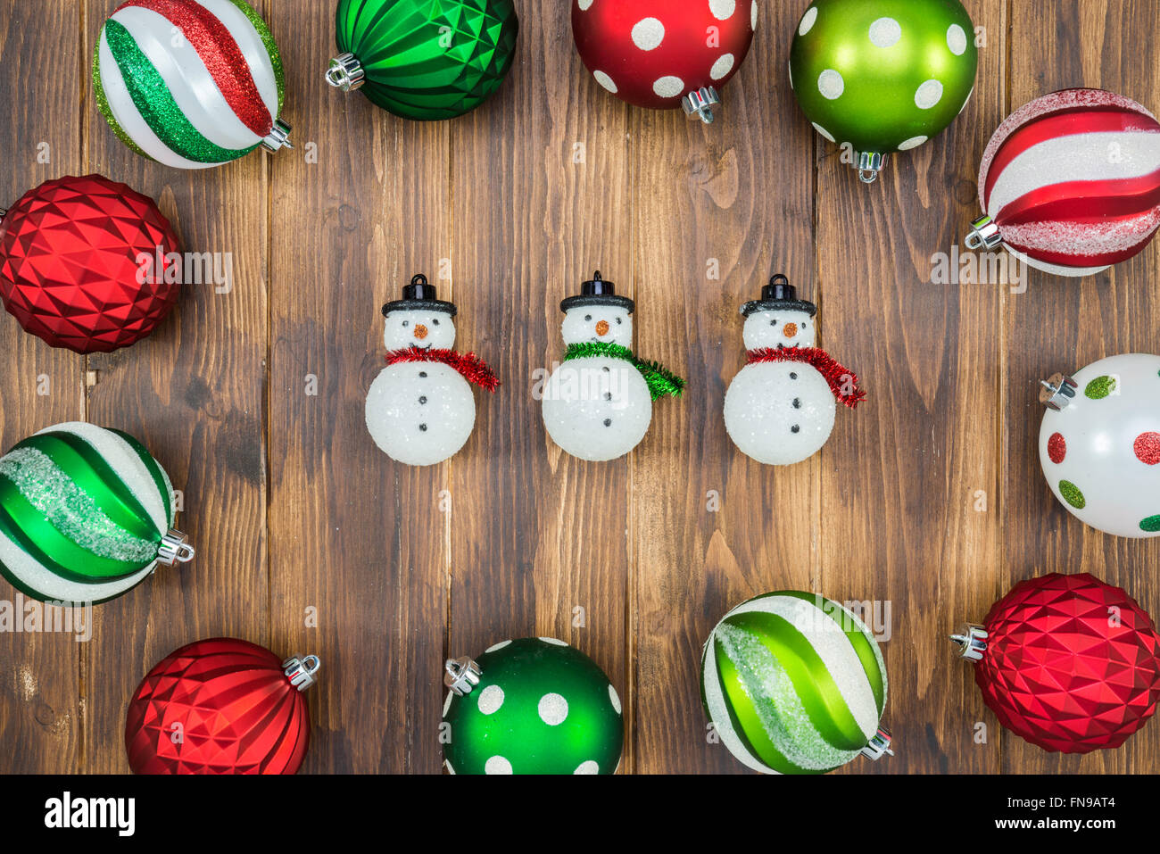 Luxury colorful Christmas ball with snowman on wooden background decoration Stock Photo