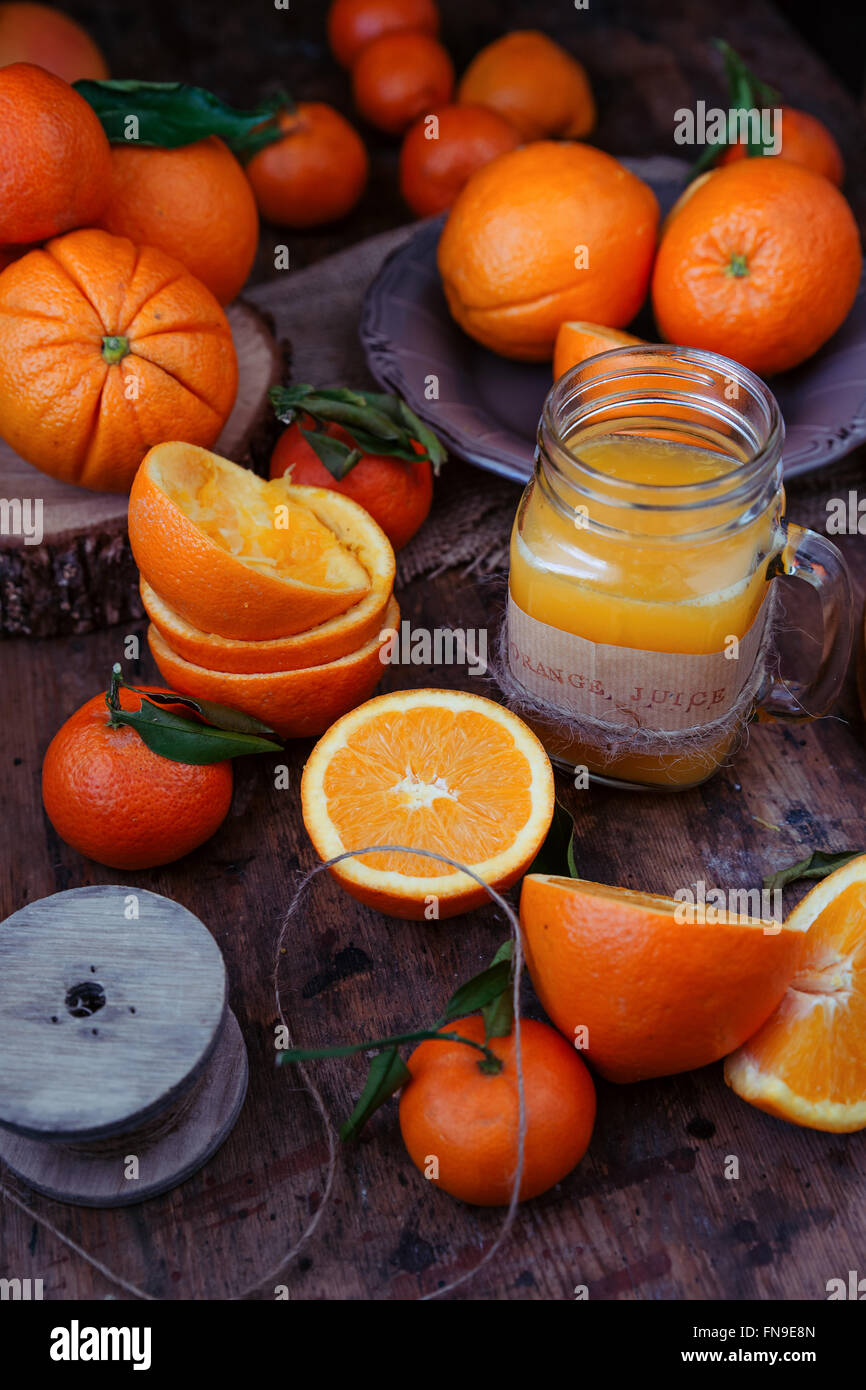 Freshly squeezed orange juice and oranges Stock Photo Alamy