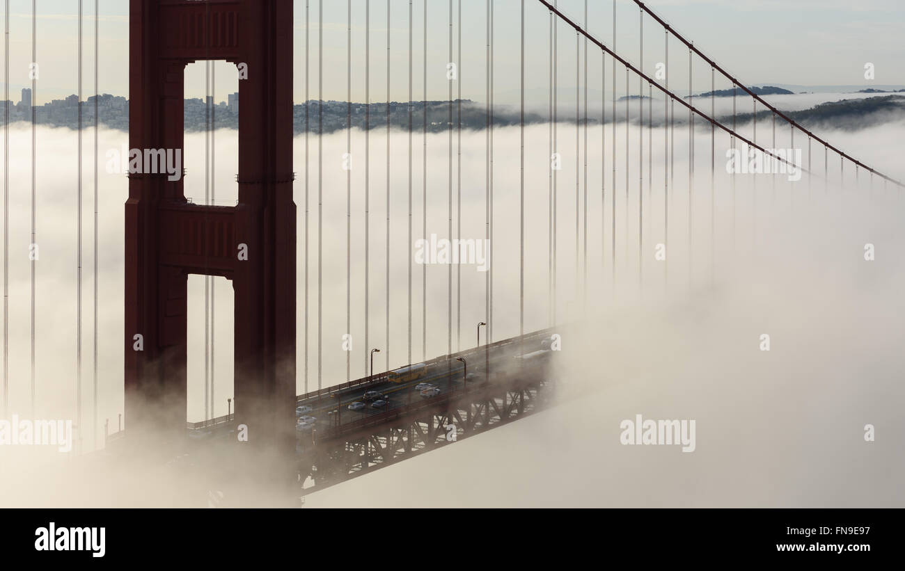 Golden Gate Bridge in fog, San Francisco, California, United States Stock Photo