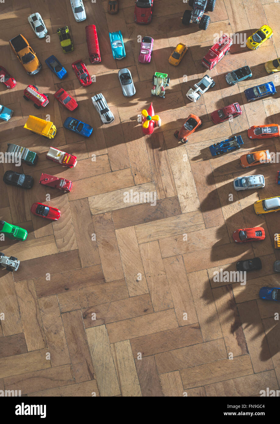 Overhead view of toy cars on the floor Stock Photo