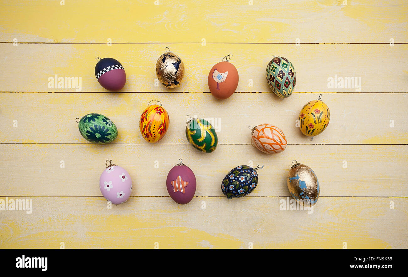 hand painted easter eggs on wooden table Stock Photo