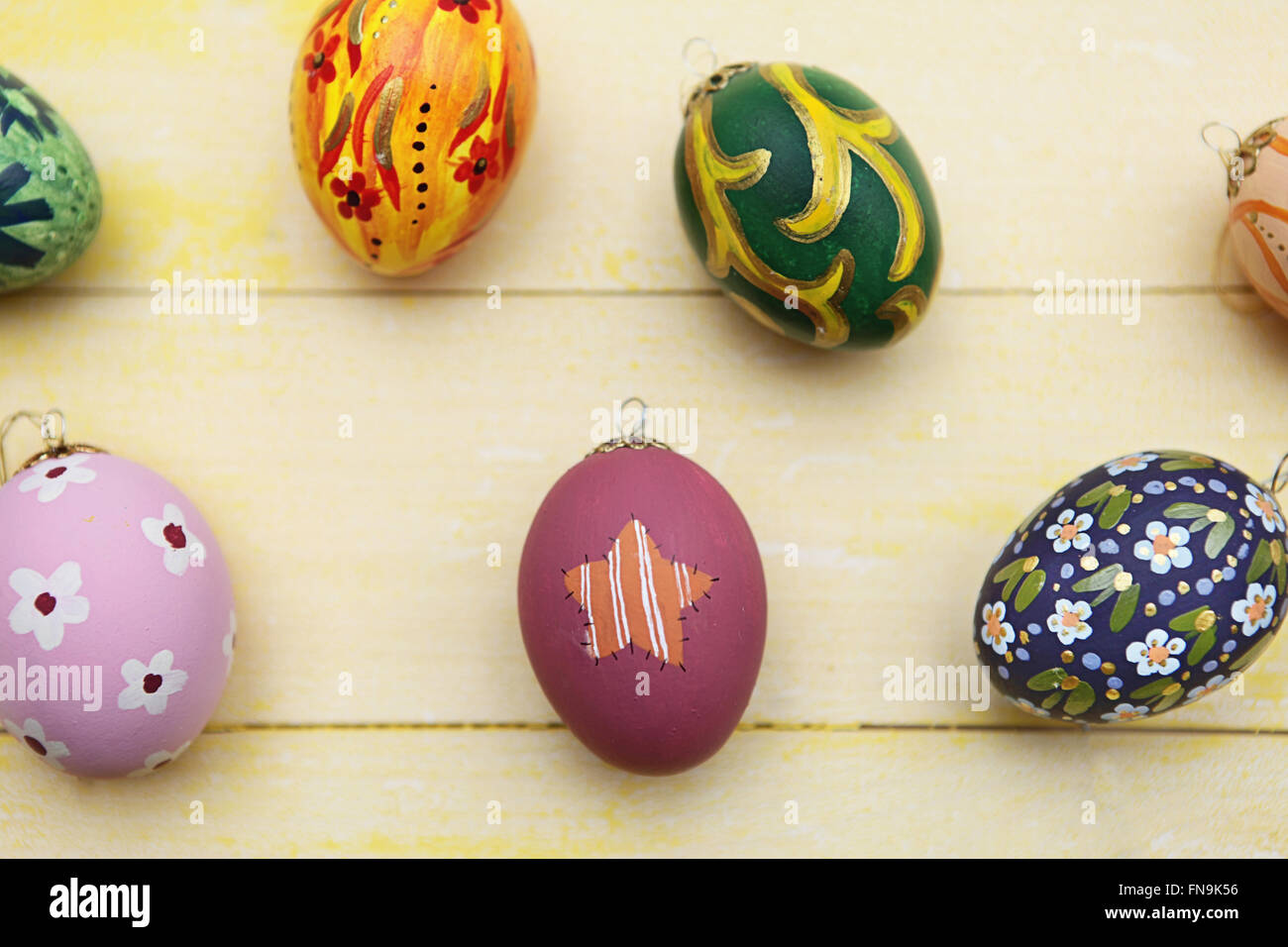 Close-up of hand painted easter eggs on wooden table Stock Photo