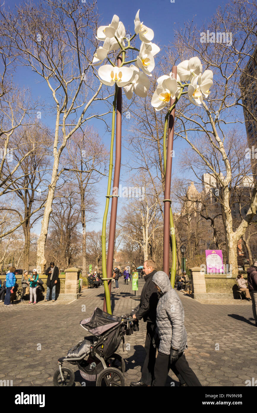 Isa Genzken's 'Two Orchids' are a harbinger of spring during its exhibit in the Doris C. Freedman Plaza of Central Park in New York on Sunday, March 6, 2016.  The 28 and 34 foot tall sculpture is constructed of stainless steel. The exhibition is sponsored by the Public Art Fund and will be on view until August 21, 2016.  (© Richard B. Levine) Stock Photo