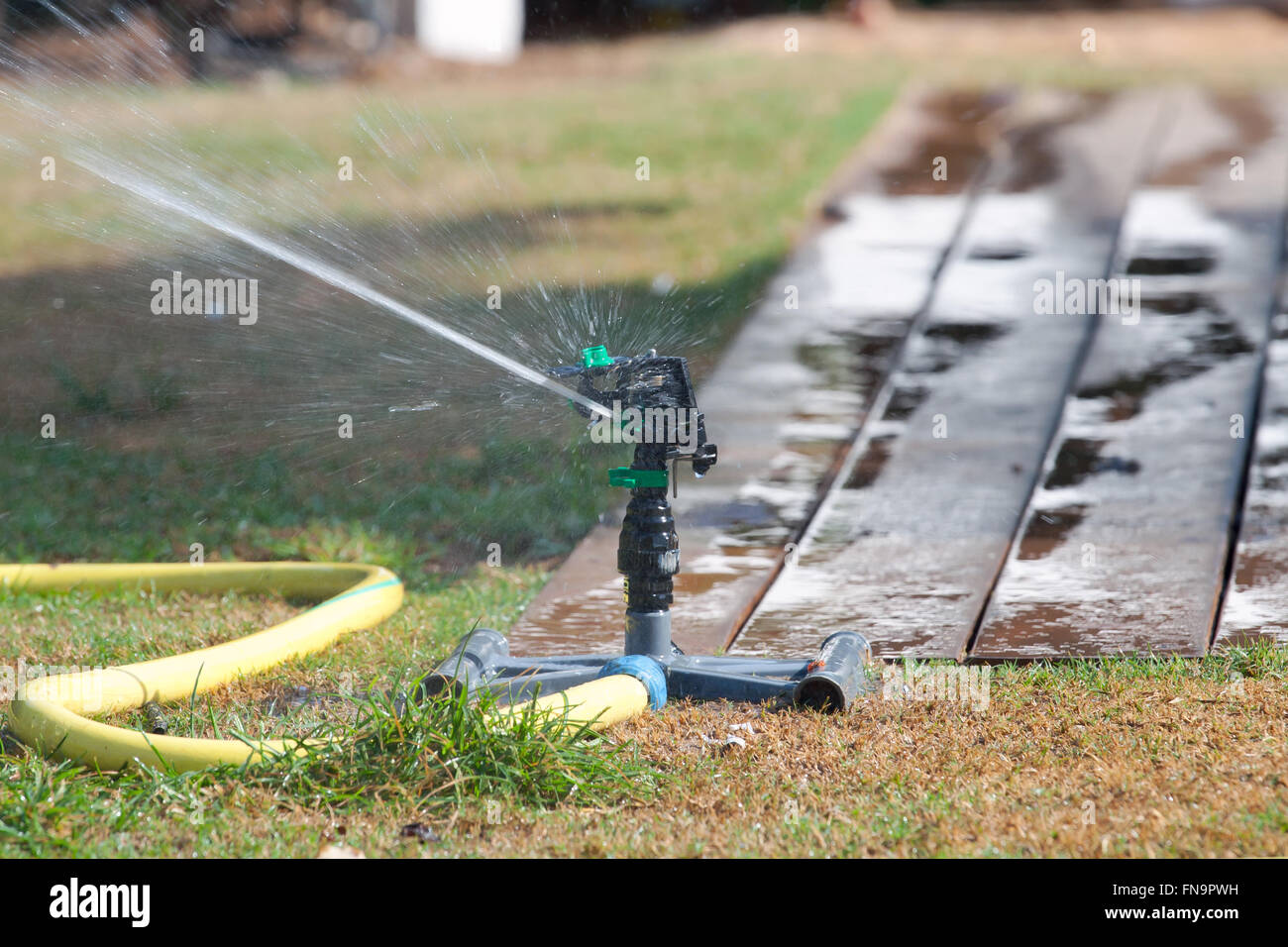 Kid In A Sprinkler Hi Res Stock Photography And Images Alamy