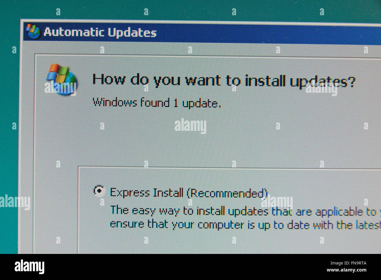 The standard 'Automatic Updates' pop up on a Windows XP computer. Stock Photo