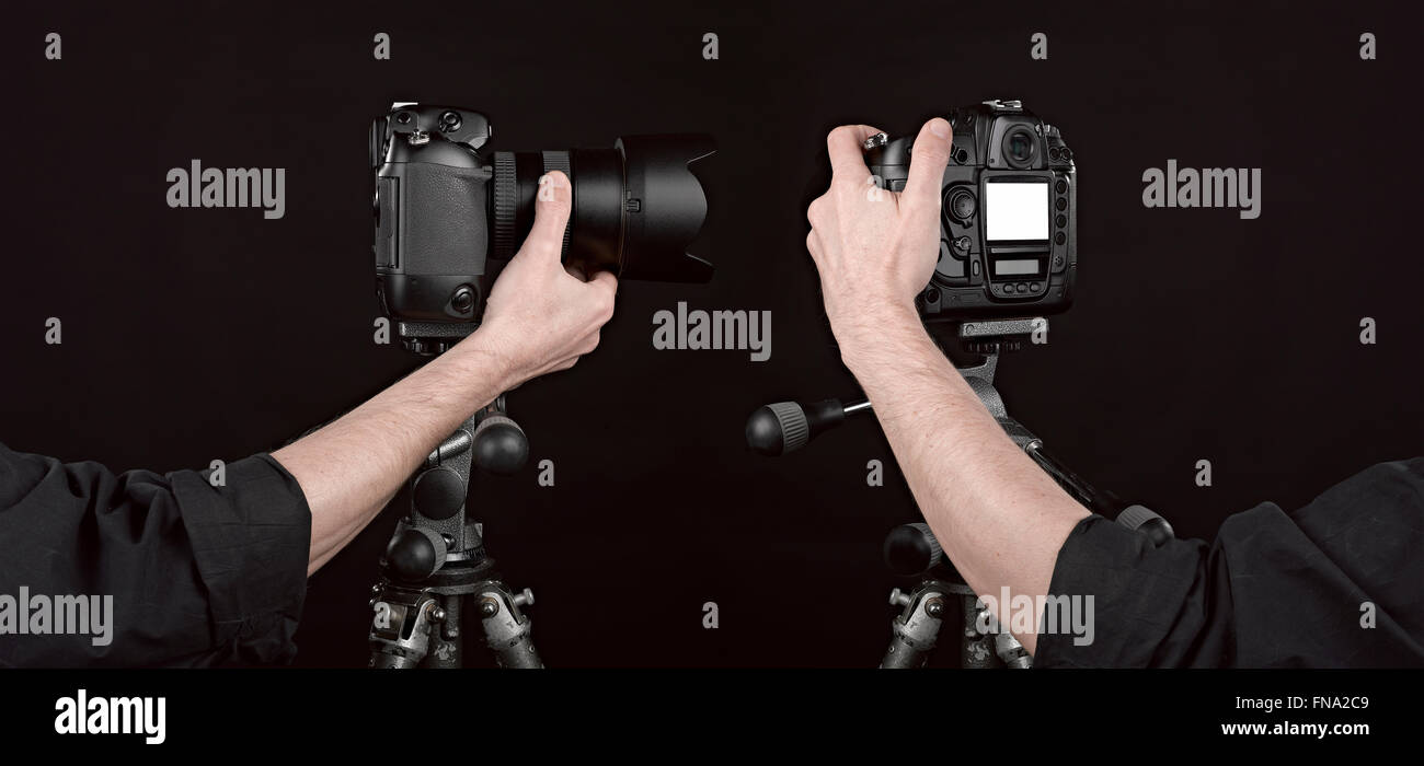 Two angle of Black digital camera on black background with photographer