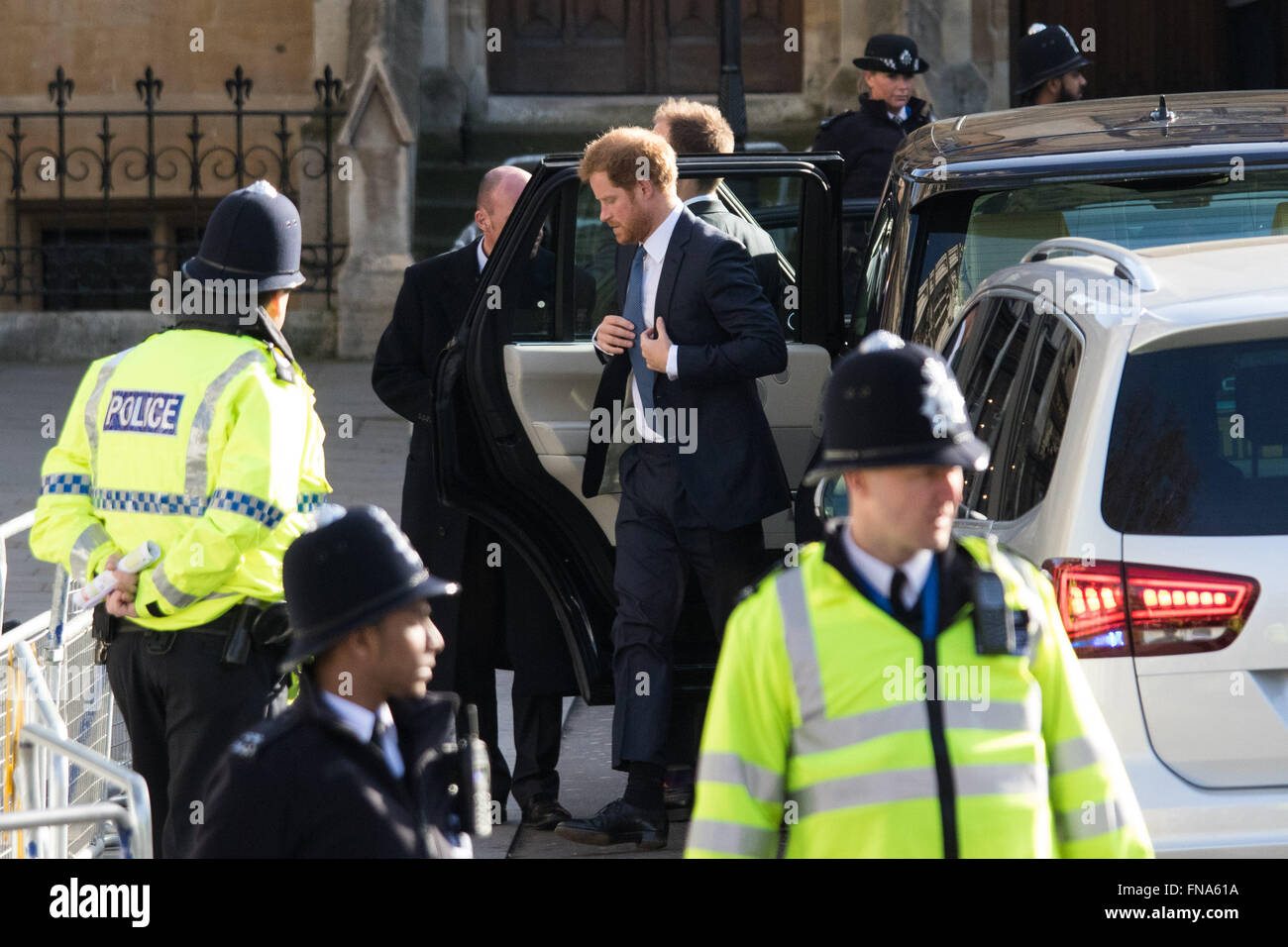 Westminster Abbey, London, March 14th 2016.  Her Majesty The Queen, Head of the Commonwealth, accompanied by The Duke of Edinburgh, The Duke and Duchess of Cambridge and Prince Harry attend the Commonwealth Service at Westminster Abbey on Commonwealth Day. PICTURED: Prince Harry arrives. Credit:  Paul Davey/Alamy Live News Stock Photo