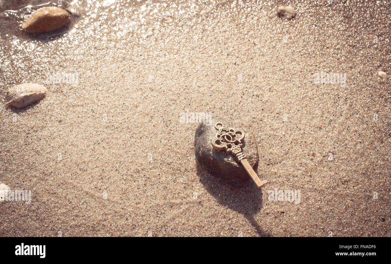 Key to the lake sand Stock Photo - Alamy