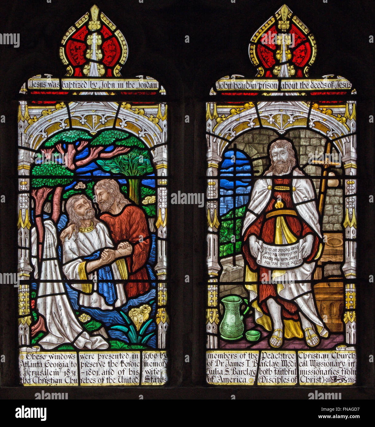 JERUSALEM, ISRAEL - MARCH 5, 2015: The baptism of Christ, and St. John the Baptist on the windowpane. Stock Photo
