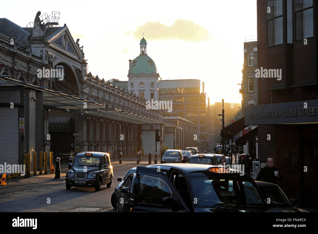 View of taxis near Smithfield Market, Charterhouse Street in (Smithfields) Farringdon London UK  KATHY DEWITT Stock Photo