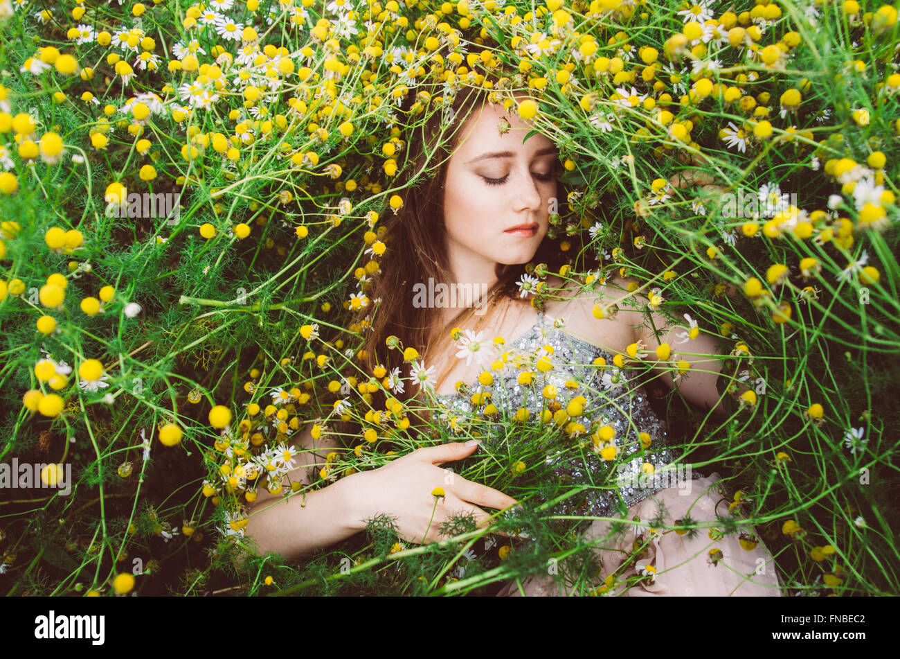 Portrait of young girl with closed eyes in chamomile field Stock Photo ...
