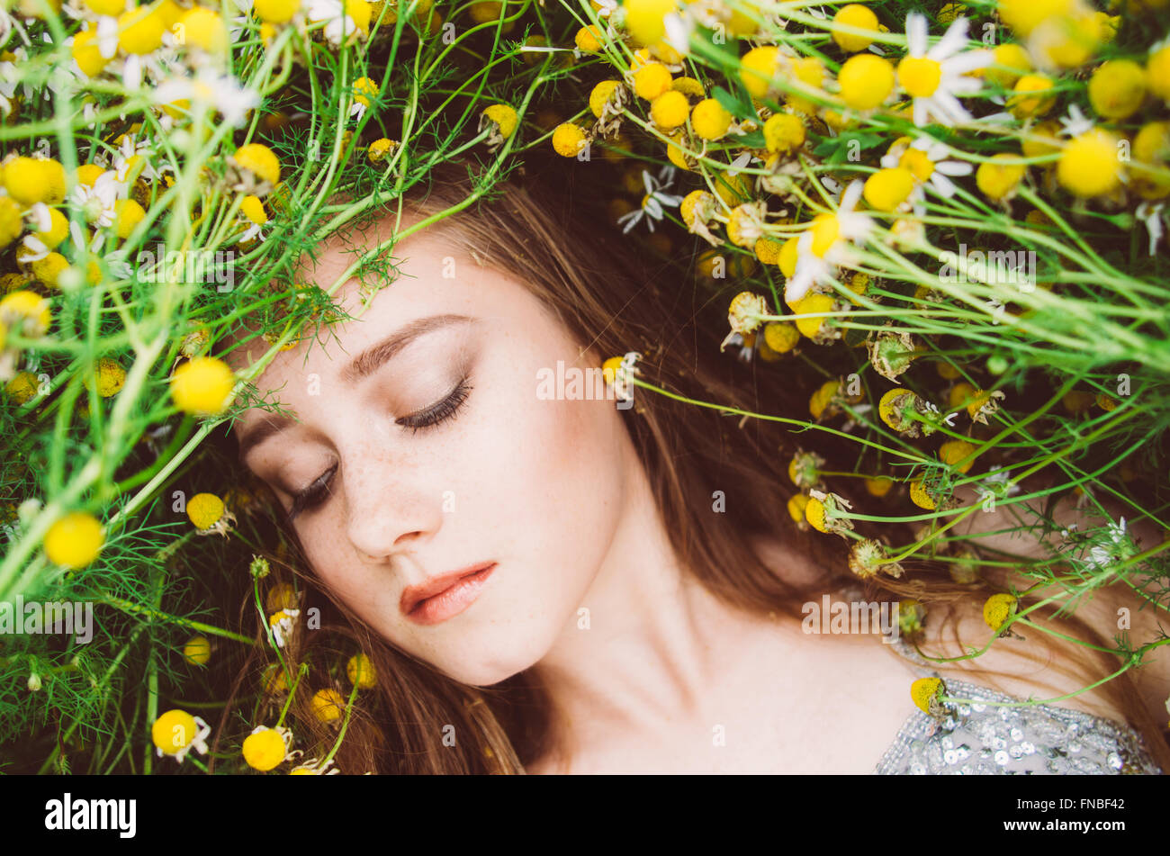 Portrait of young girl with closed eyes in chamomile field Stock Photo ...