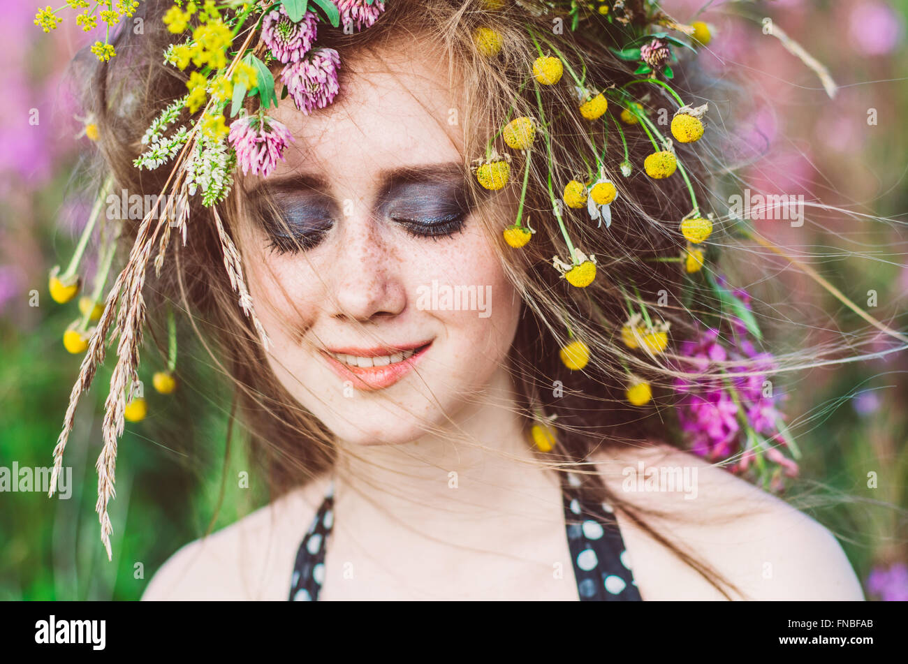 Portrait of young girl with closed eyes in willow-herb field Stock ...