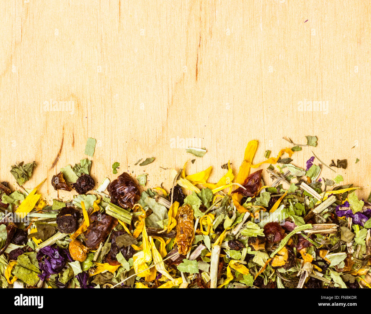 Border frame of assorted natural medical dried herb leaves and flower ...