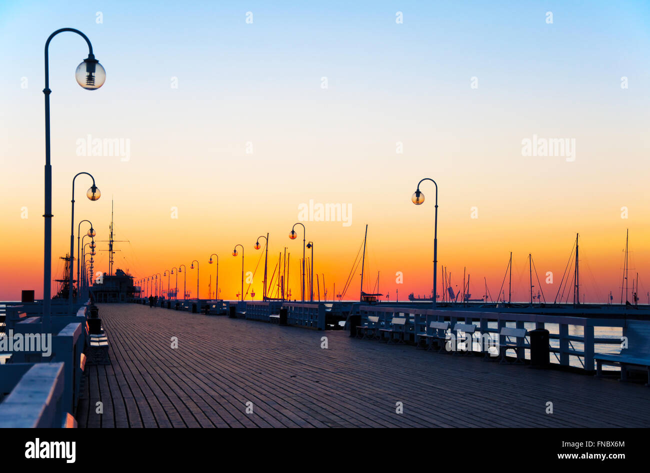 Sunrise at the wooden pier (molo) in Sopot, Poland Stock Photo