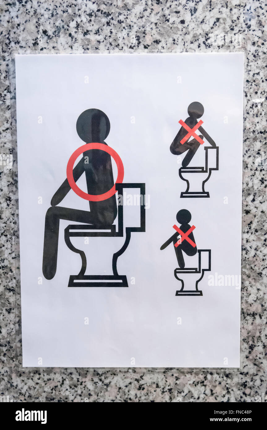 Funny instructional toilet sign, Japan Stock Photo Alamy