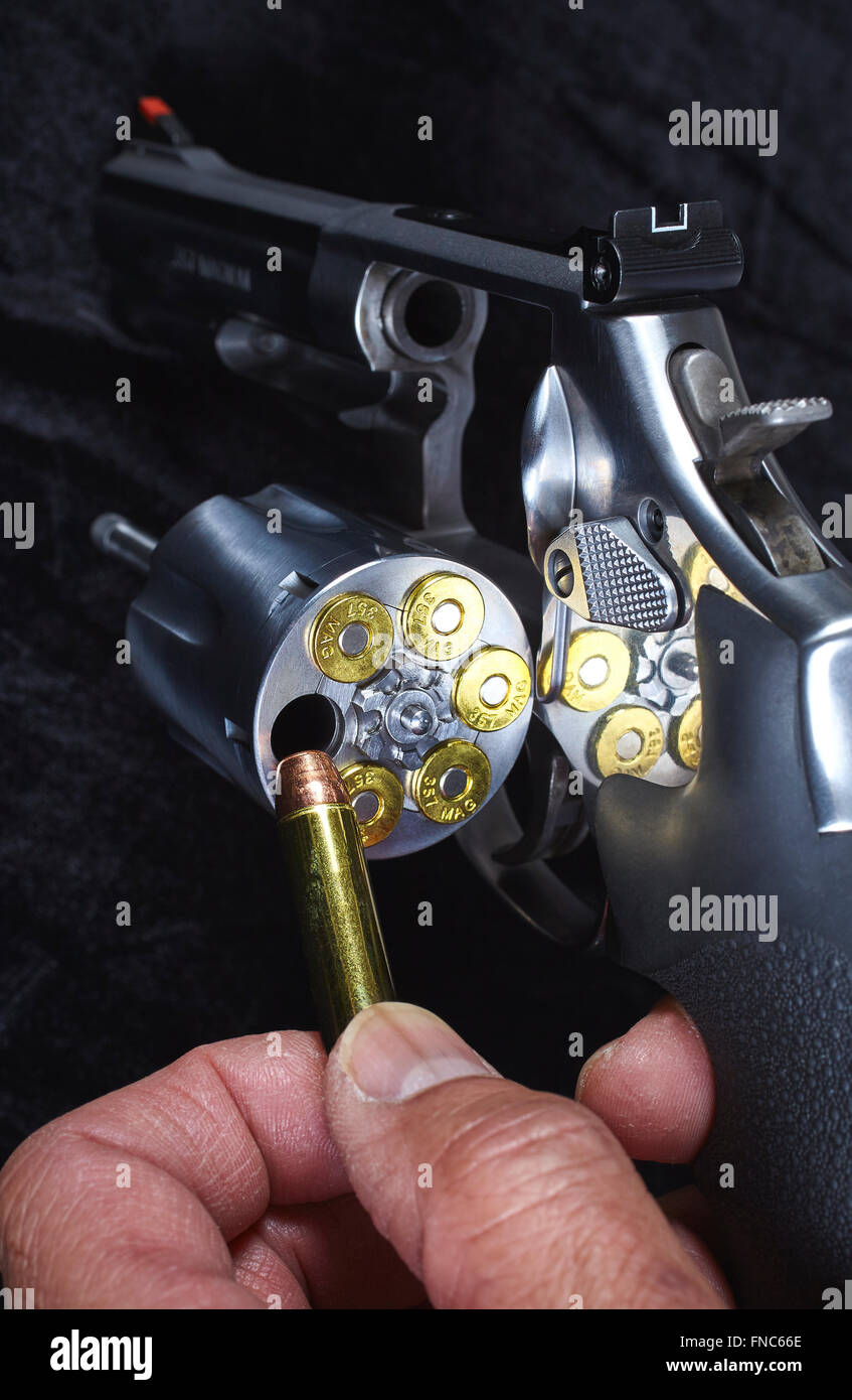 Man Loading Magnum Revolver Closeup Stock Photo - Alamy