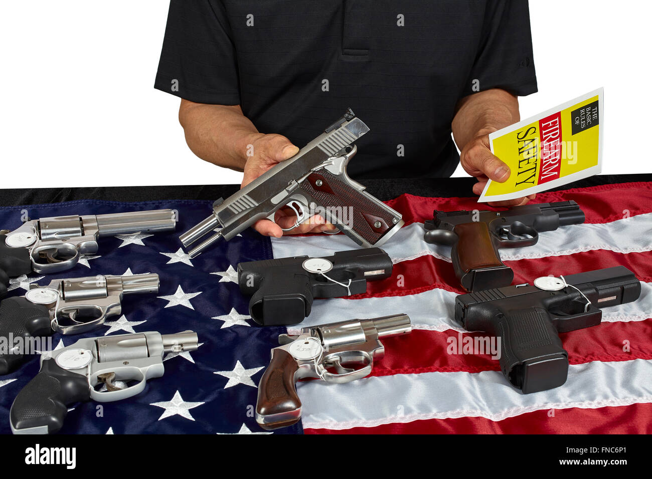 Man with guns for sale with safety brochure on USA America Flag Stock Photo