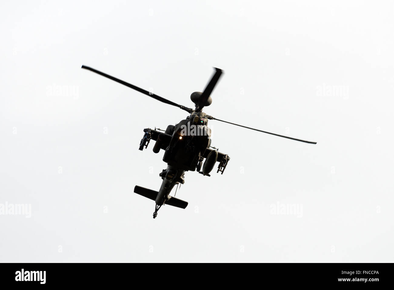 Army Air Corp apache helicopter from RAF Wattisham over Woodbridge airfield training area, Rendlesham, Suffolk, UK. Stock Photo