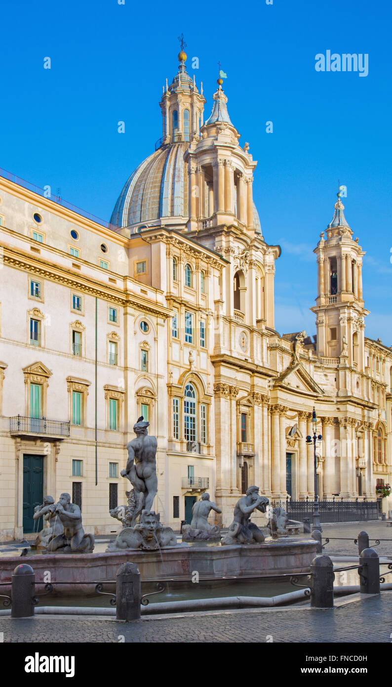 Rome - Piazza Navona and baroque Santa Agnese in Agone church in morning light and Fontana del Moro. Stock Photo