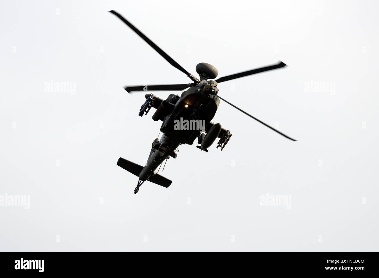 Army Air Corp apache helicopter from RAF Wattisham over Woodbridge airfield training area, Rendlesham, Suffolk, UK. Stock Photo
