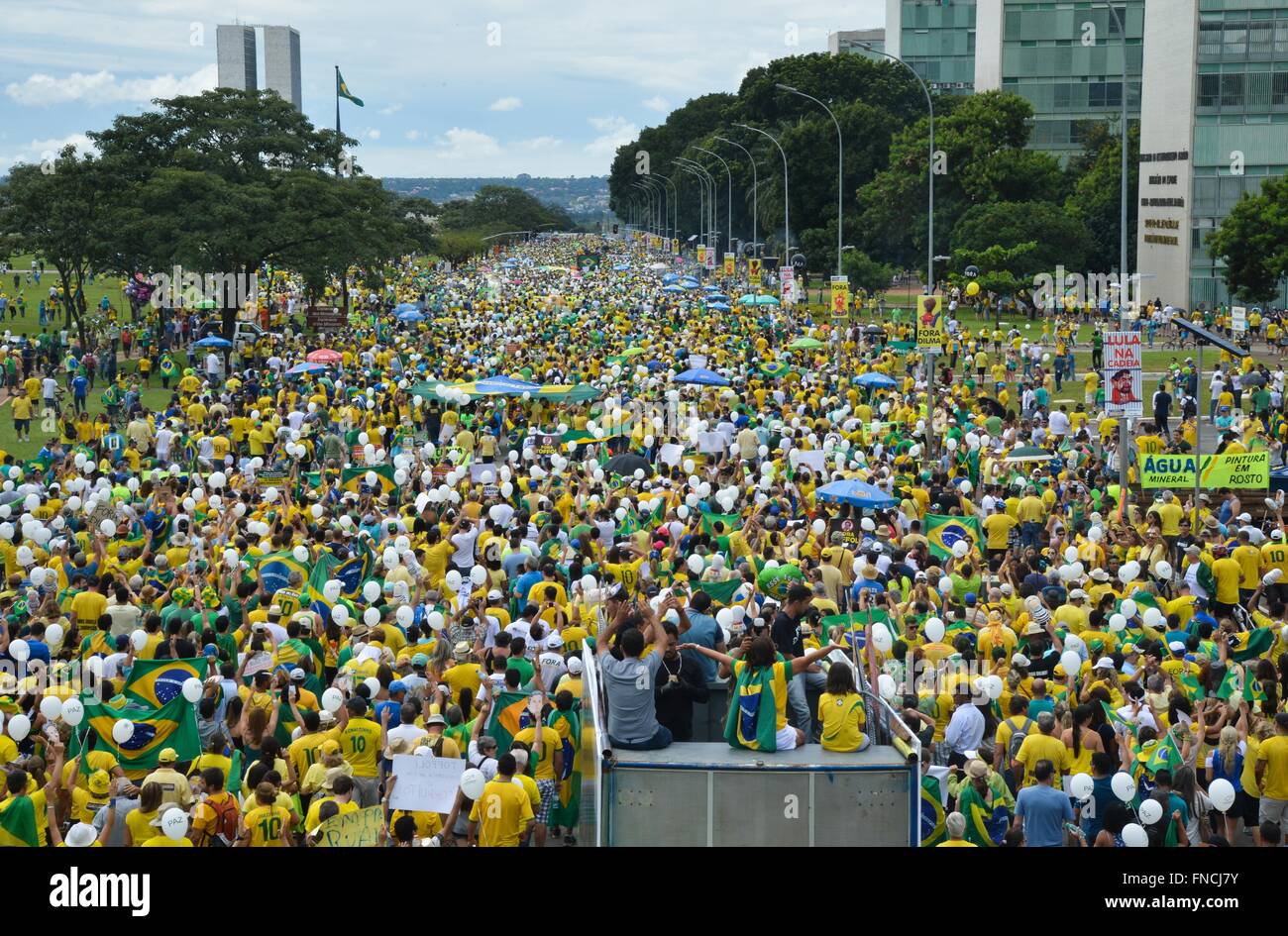 Brasilia, Brazil. 13th Mar, 2016. Tens of thousands of protesters gather outside the government district in the capital to demand the resignation of Brazilian President Dilma Rousseff March 13, 2016 in Brasilia, Brazil. Rousseff rejected calls for her resignation amidst a political storm deepened by a massive corruption scandal. Stock Photo
