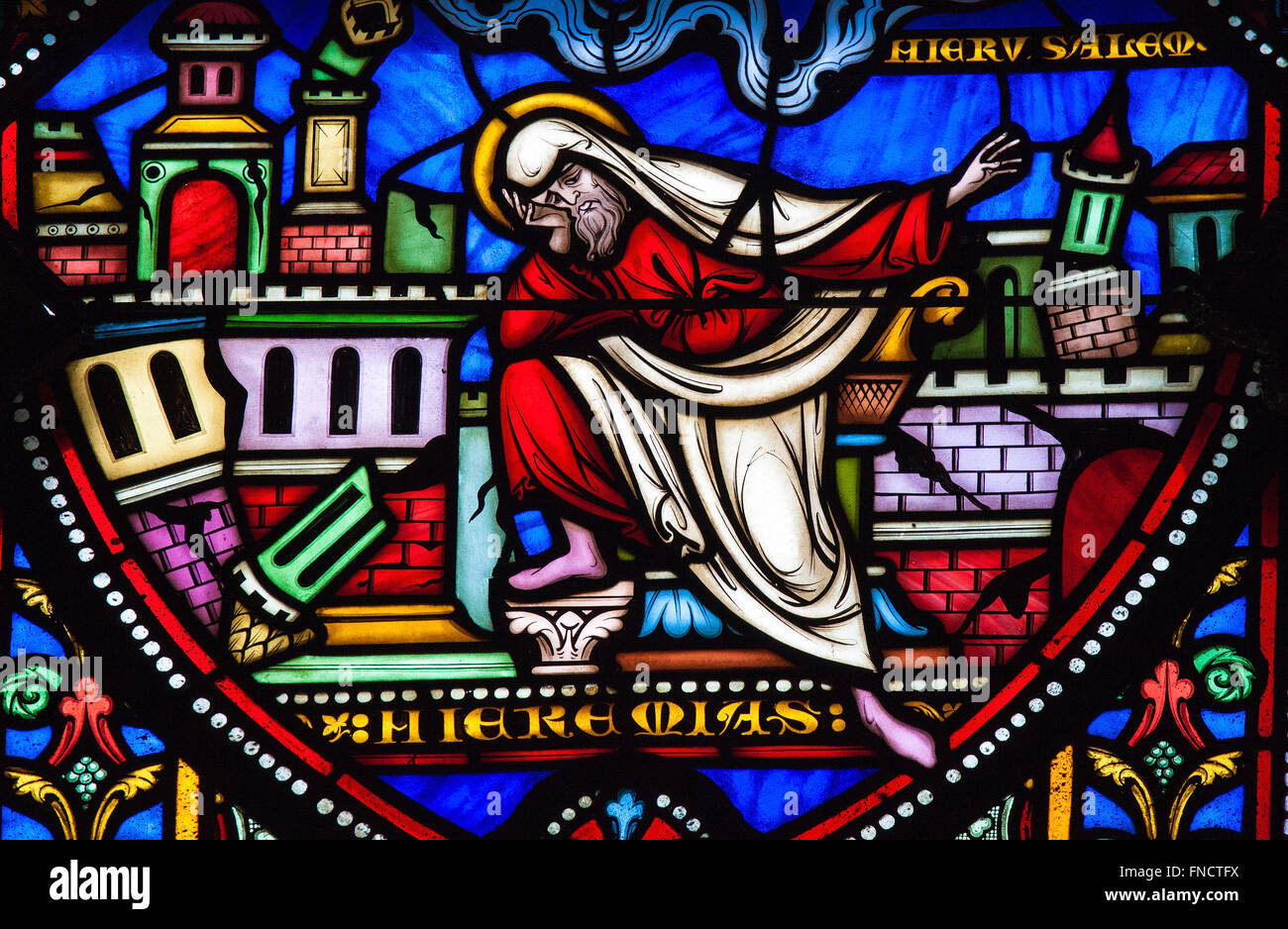 Stained Glass window of the prophet Jeremiah lamenting the destruction of Jerusalem Stock Photo