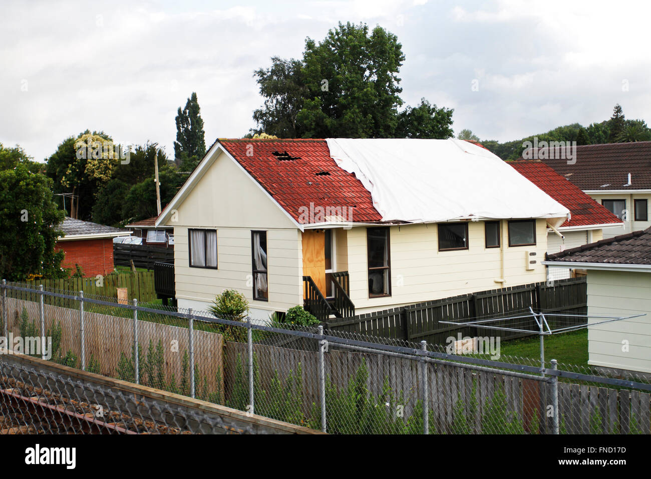 House near railway track in New Zealand. View from inside the open