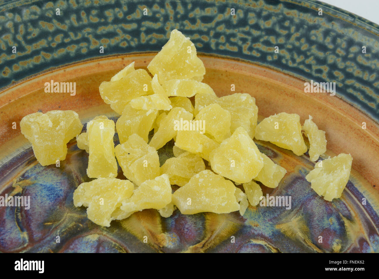 Dried pineapple chunks on plate Stock Photo - Alamy
