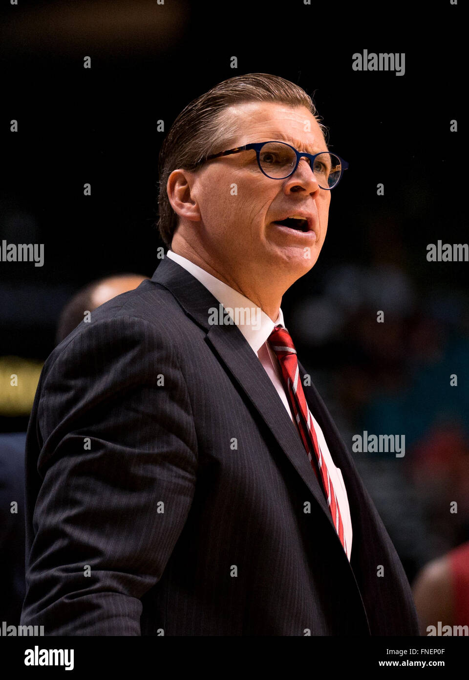 Las Vegas, NV, USA. 09th Mar, 2016. Stanford Cardinal assistant coach Tim O'Toole tries to fire up his team during the game between the Washington Huskies vs the Stanford Cardinal at the MGM Grand in Las Vegas, Nevada. Washington defeated Stanford 91-68.(Mandatory Credit: Juan Lainez/MarinMedia/Cal Sport Media) © csm/Alamy Live News Stock Photo