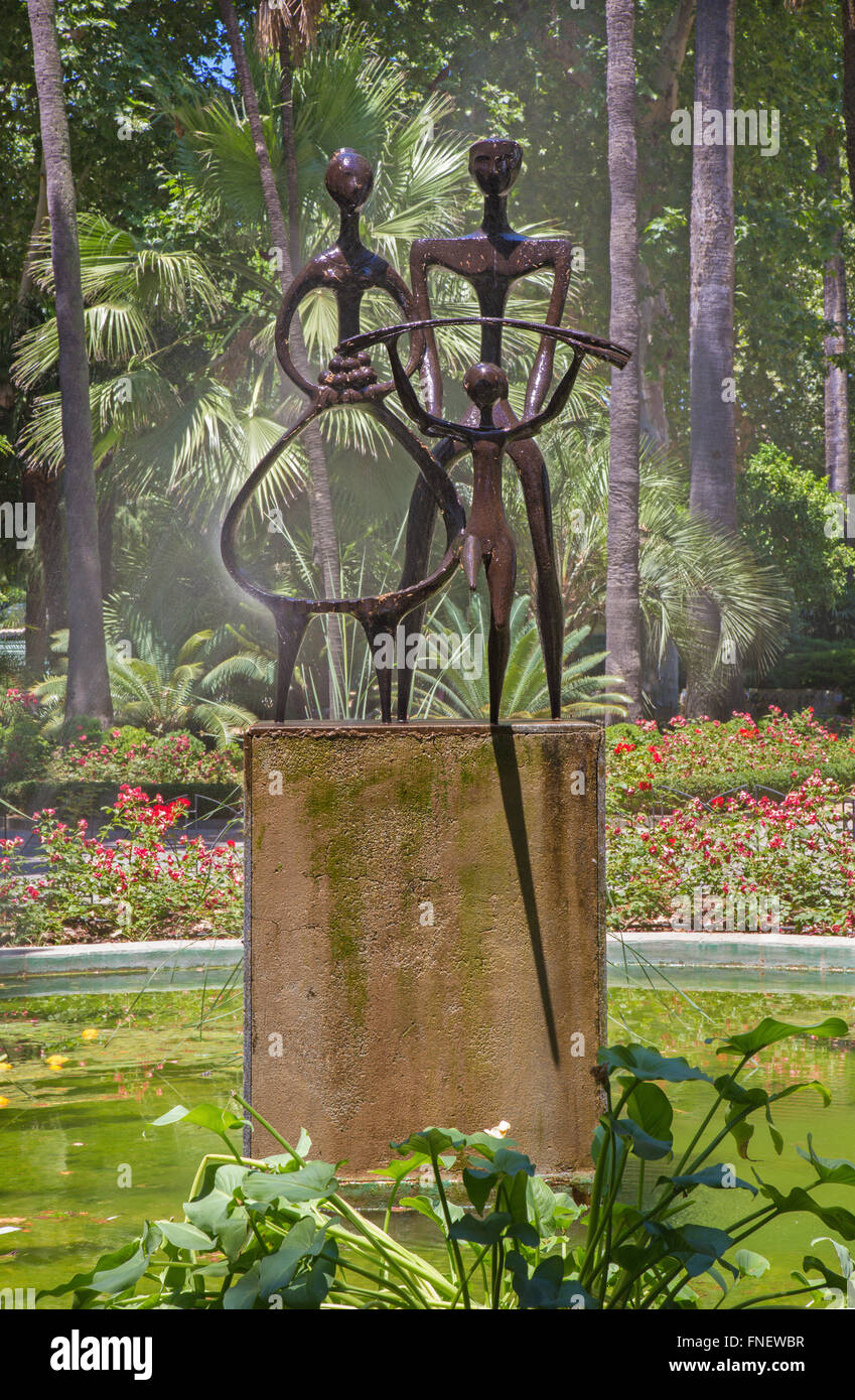 CORDOBA, SPAIN, 2015: The fountain 'Agricultor, Agricultura, y Progreso' Jose Carrilero (1964) in Jardines de la Agricultura. Stock Photo