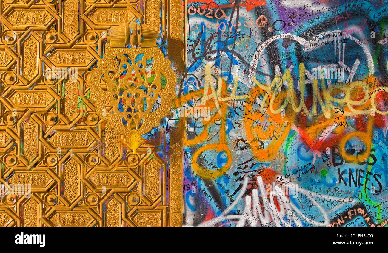 PRAGUE, CZECH REPUBLIC - , 9/11, 2010: Detail of John Lennon Peace Wall created in 1980 and the gate of Cathedral of Seville. Stock Photo
