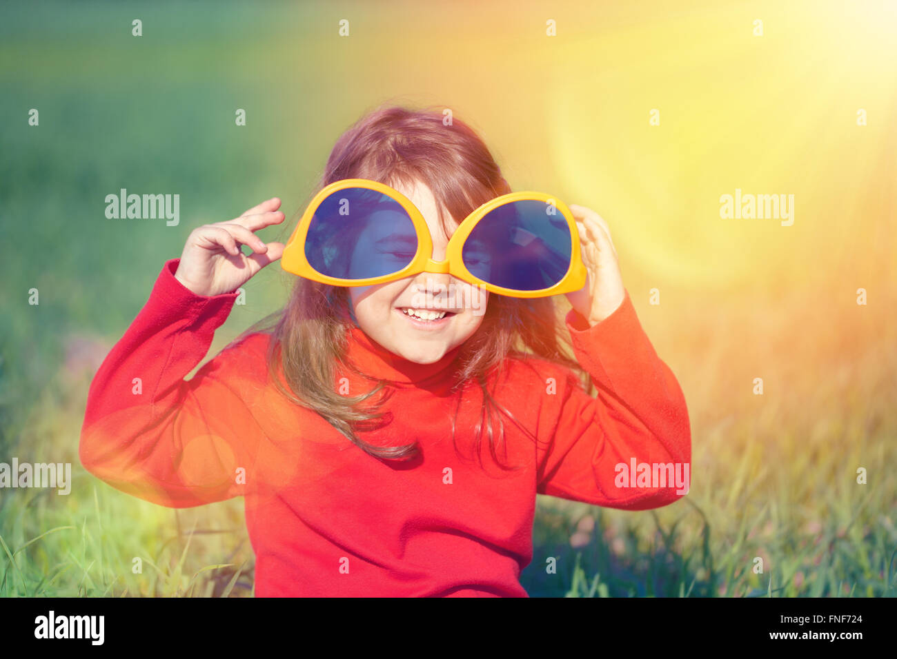 Happy little girl big sunglasses hi-res stock photography and images - Alamy