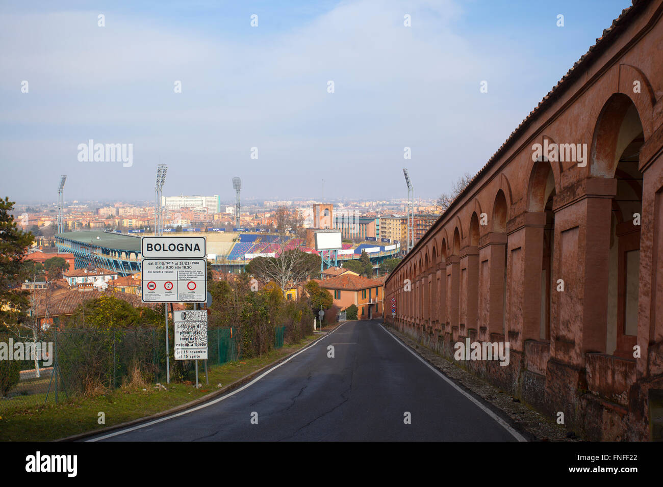 View of Bologna and the stadium from the way to Sanctuary of the Madonna of San Luca. Emilia Romagna, Italy. Stock Photo