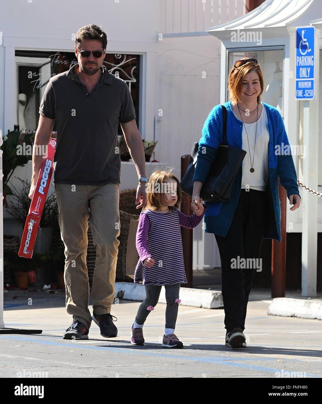 Alyson Hannigan and her husband Alexis Denisof out and about with their