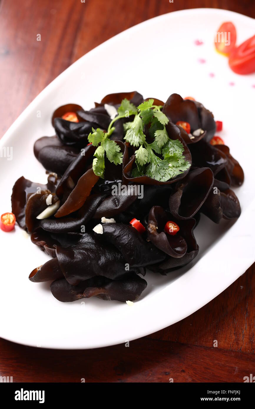 Cloud ear fungus with chili served on a plate Stock Photo Alamy