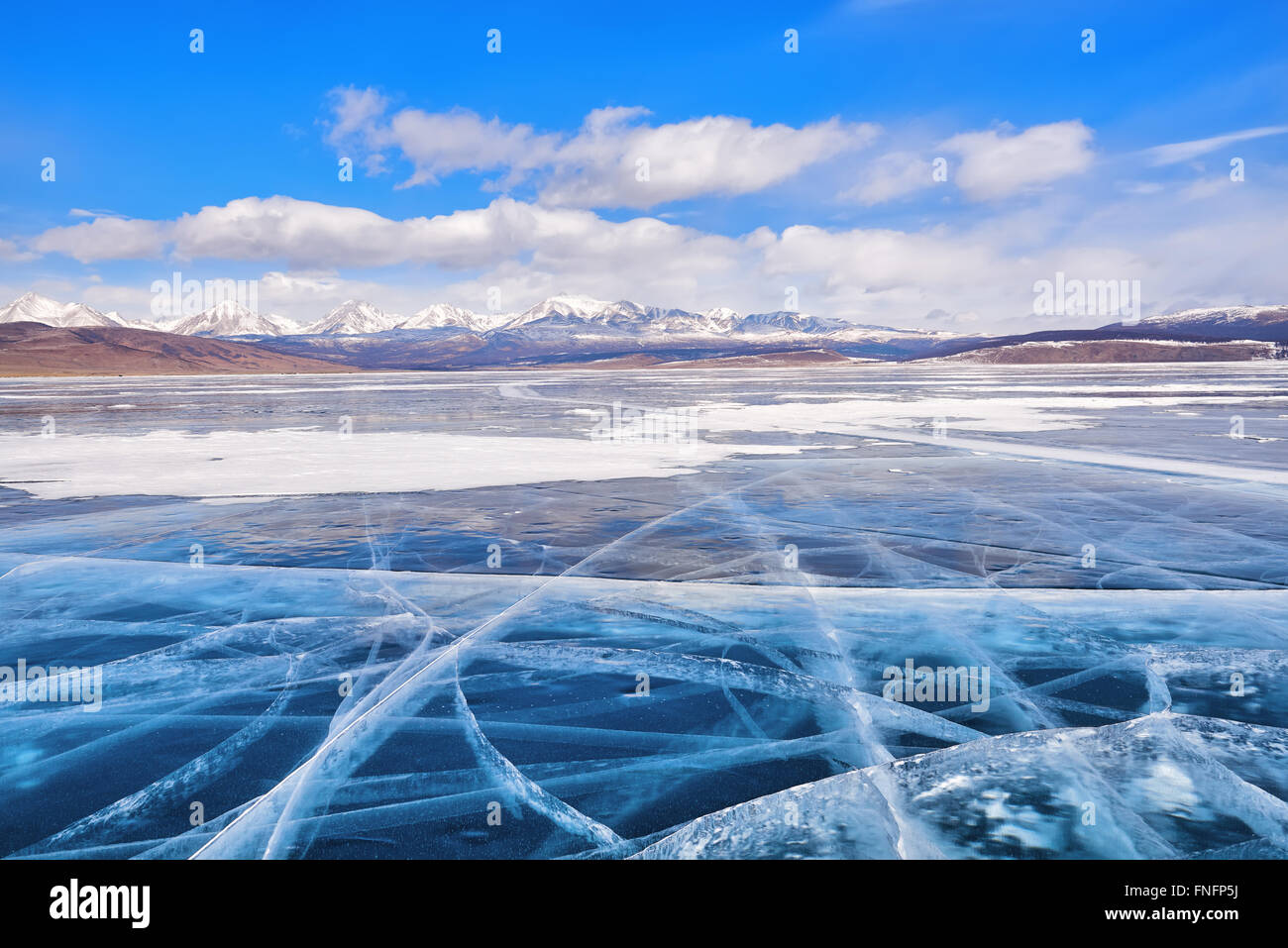 Transparent ice large mountain lake . Lake Hovsgol . Mongolia Stock Photo
