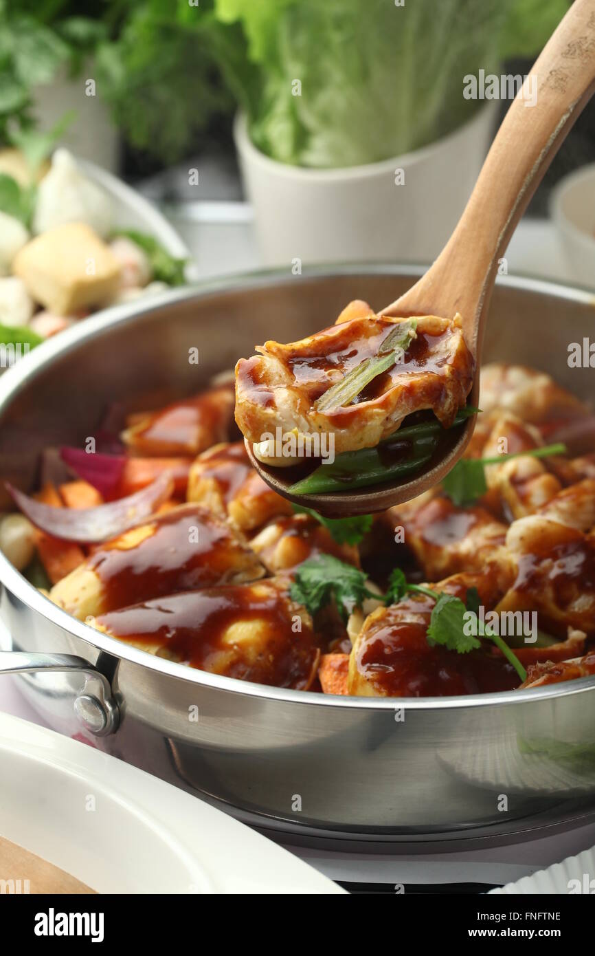 Chinese cuisine served in a pot Stock Photo