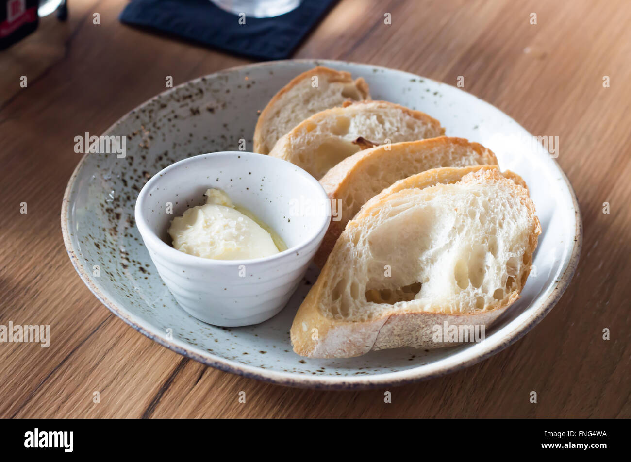 Slices of white bread with butter Stock Photo Alamy