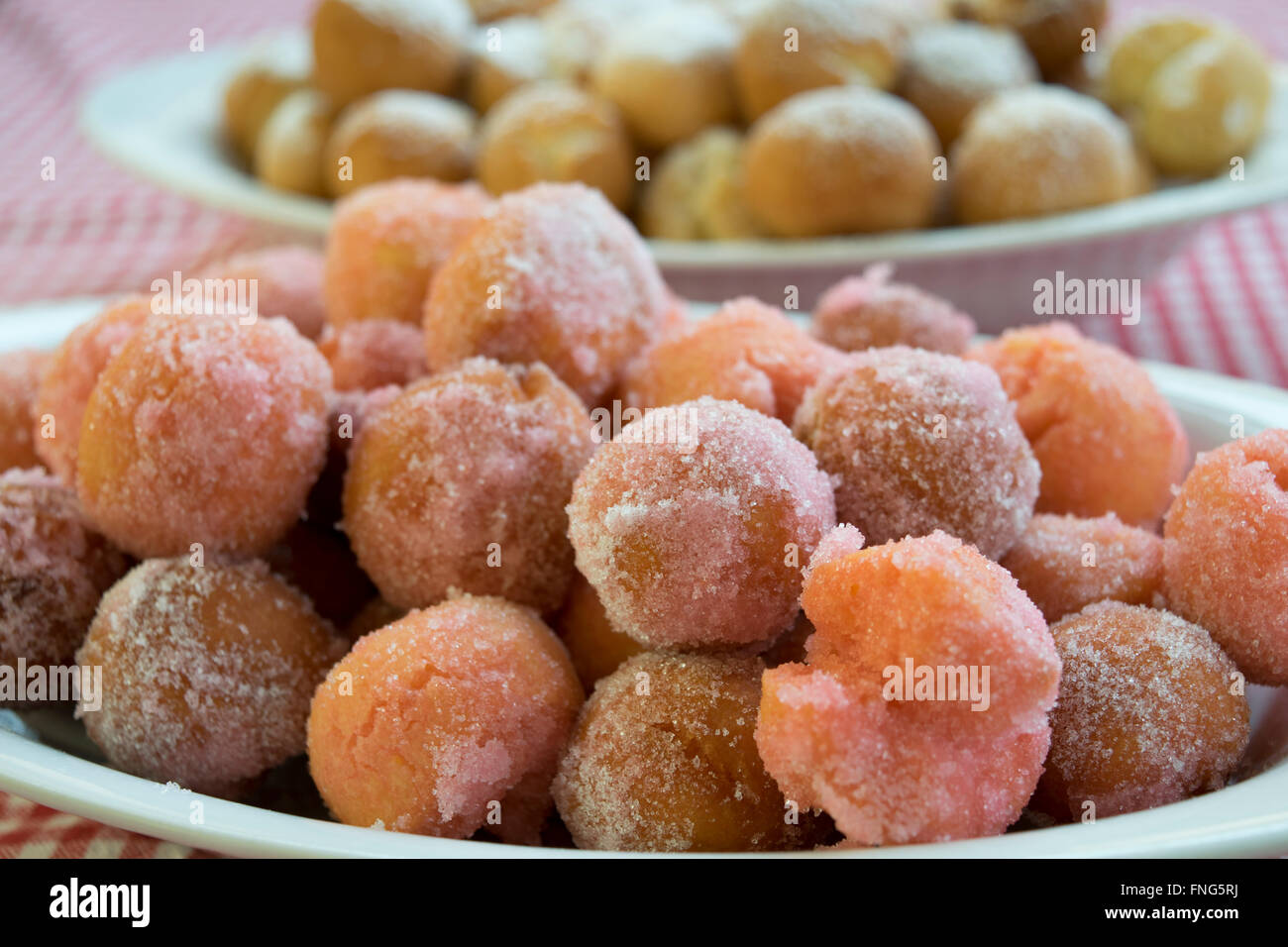 castagnole are fried  sweet dough balls with icing sugar famaus In Italy as Carnival dessert Stock Photo
