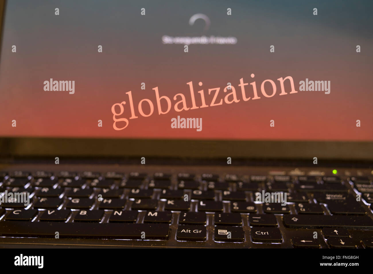 concept of globalizatione and modern technologies with a writen on the desktop of the a computer Stock Photo