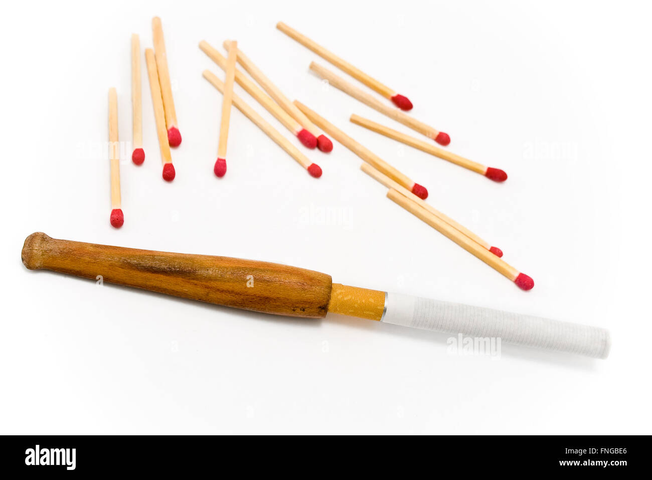 Wooden cigarette holder with matches isolated on white Stock Photo