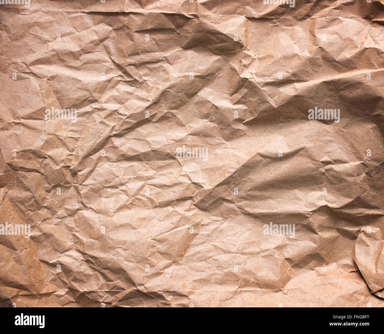 Crumpled brown kraft paper texture Stock Photo by ©stevanovicigor