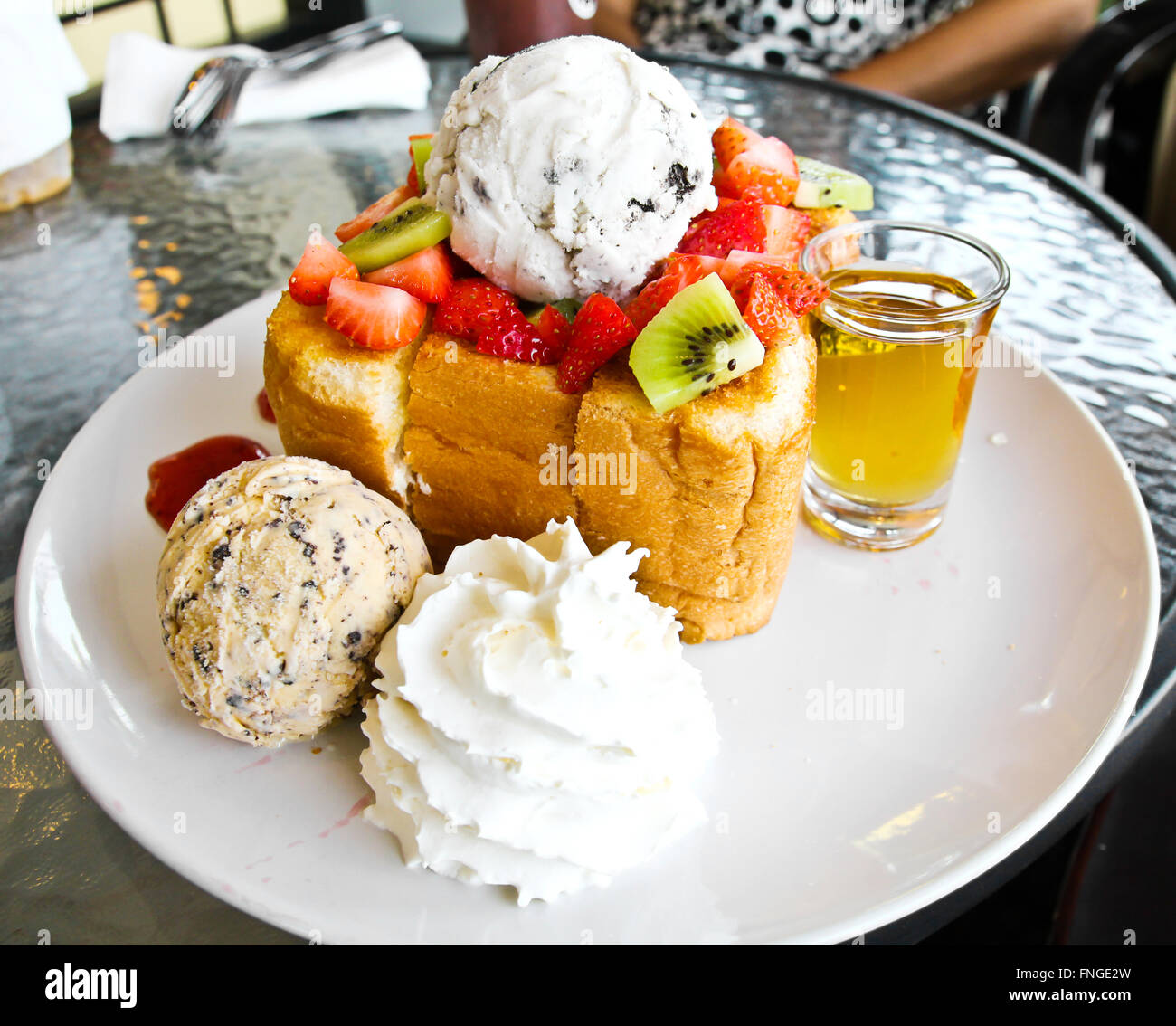Honey toast with ice cream and fruit Stock Photo