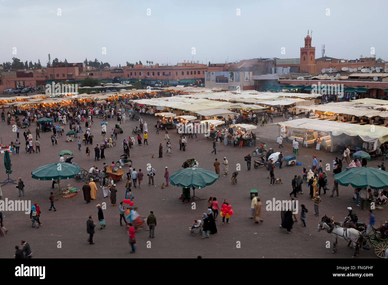 A view of the famous Djemaa El Fna square in early evening light, Marrakesh; Morocco Stock Photo